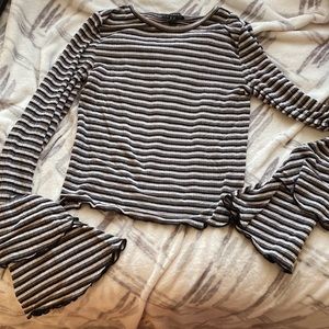 Striped shirt with flared long sleeves